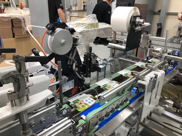 Tape Applicator on Carton Folder